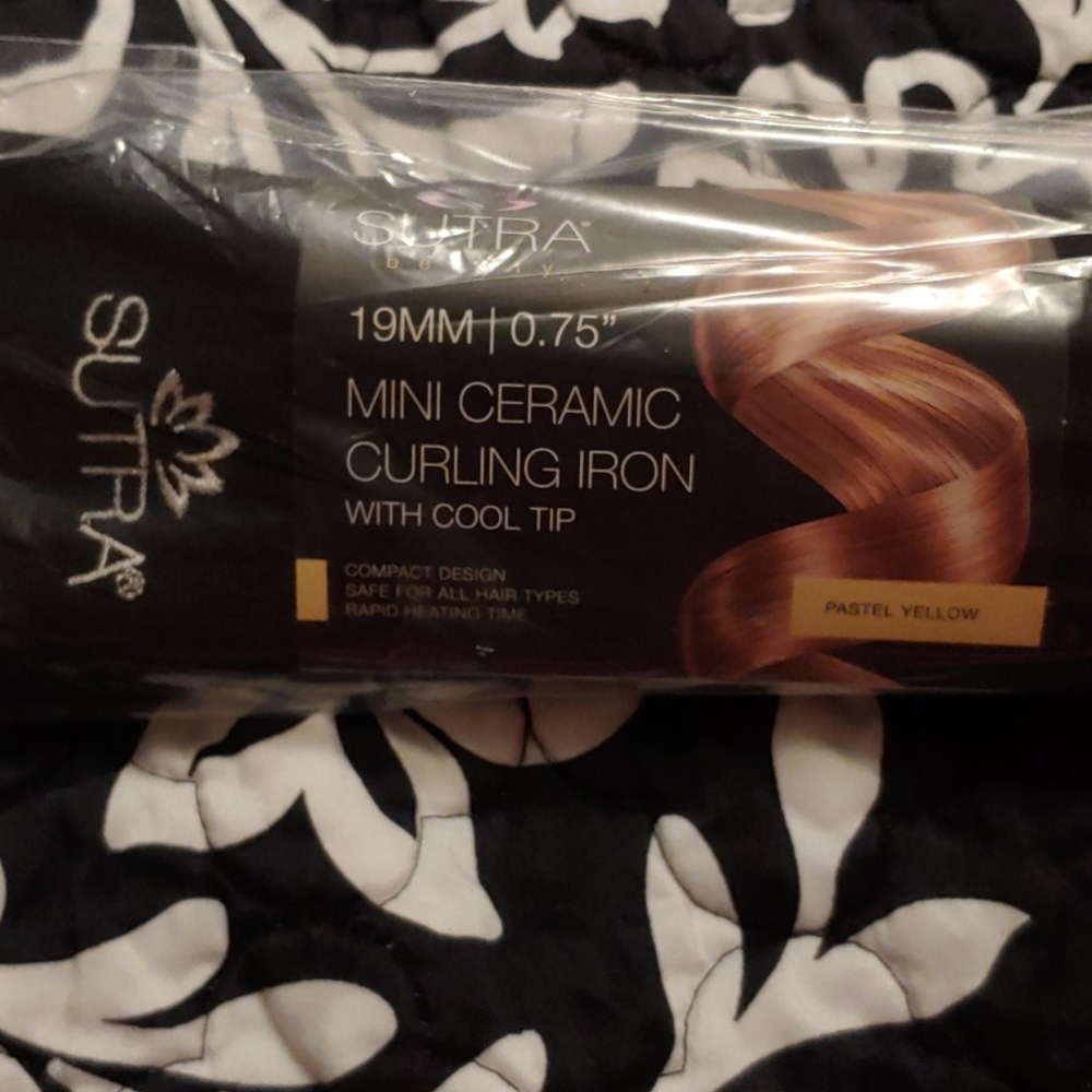 New in plastic Sutra Beauty Curling Wand w/CoolTip